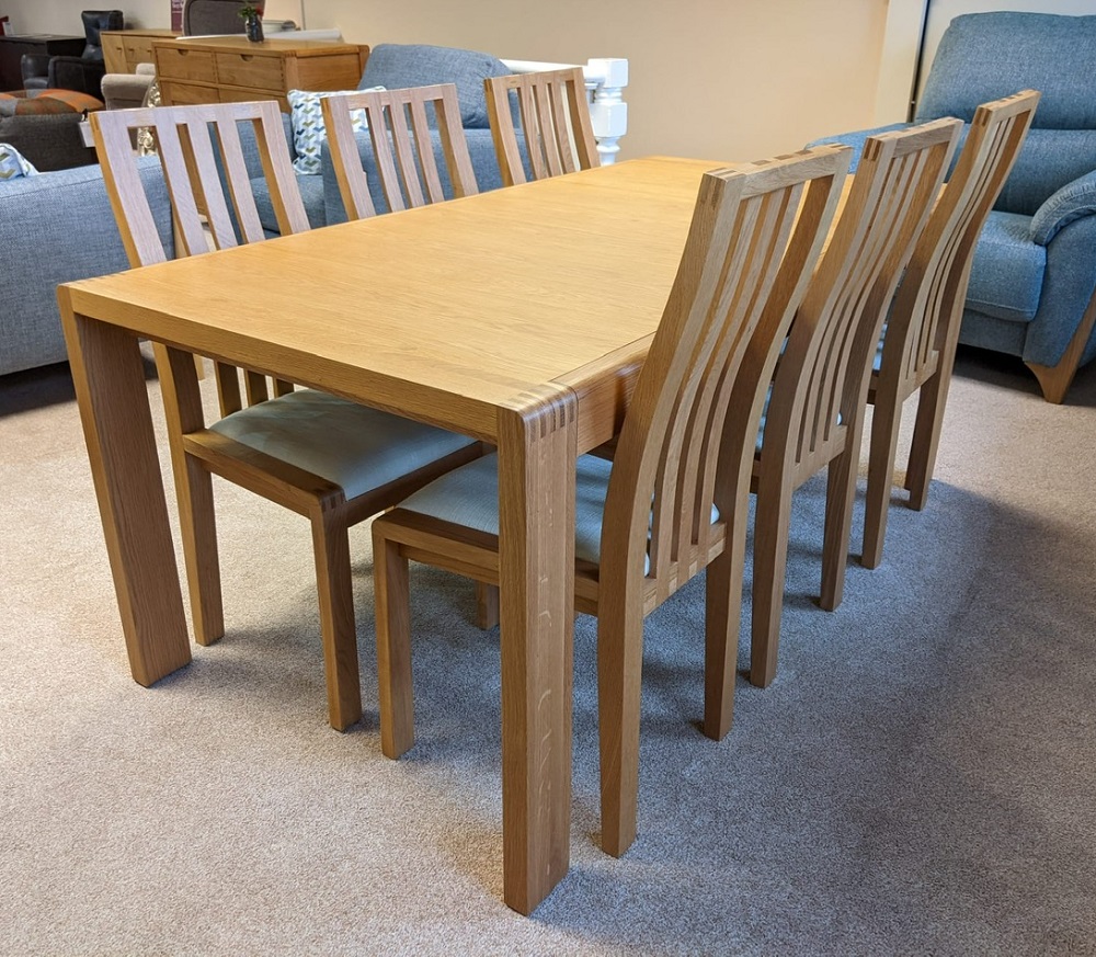 SHOWROOM CLEARANCE ITEM Ercol Furniture Bosco Medium Extending Dining Table with six dining chairs